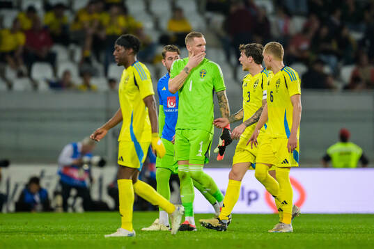 Goalkeeper Robin Olsen and Victor Nilsson Lindelöf of