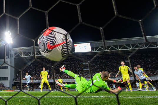 Matheus Nunes of Portugal scores 2-0 behind goalkeeper