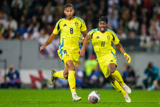 Jens Cajuste and Anthony Elanga of Sweden