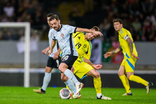 Bernardo Silva of Portugal and Mattias Svanberg of Sweden