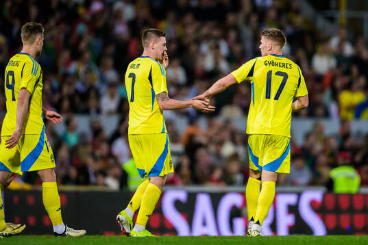 Emil Holm and Viktor Gyökeres of Sweden celebrate the 4-1