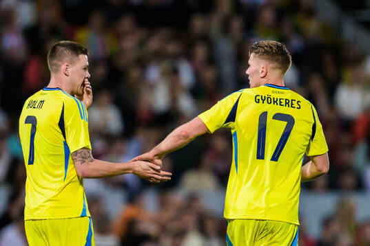 Emil Holm and Viktor Gyökeres of Sweden celebrate the 4-1