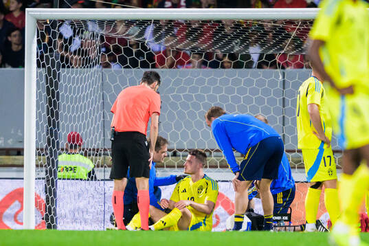 Mattias Svanberg of Sweden receives medical attention