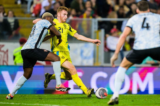Dejan Kulusevski of Sweden and Tote Gomes of Portugal