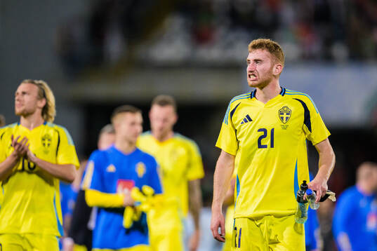 Dejan Kulusevski of Sweden looks dejected