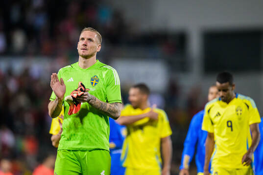 Goalkeeper Robin Olsen of Sweden looks dejected