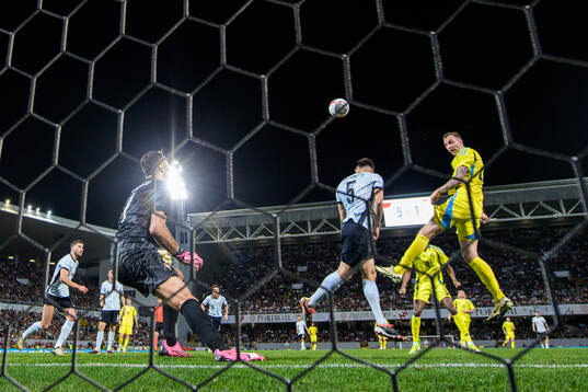 Gustaf Nilsson of Sweden scores 5-2 behind goalkeeper Rui
