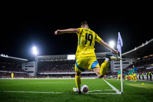 Mattias Svanberg of Sweden shoots a corner kick