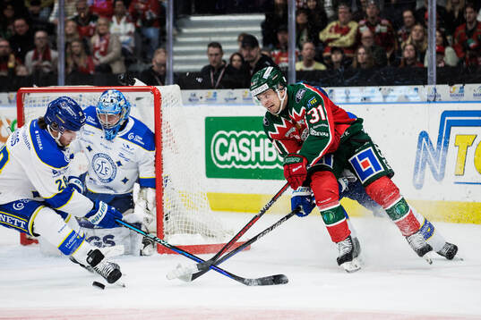 Frölundas Nicklas Lasu och Leksands Justin Glenn Kloos
