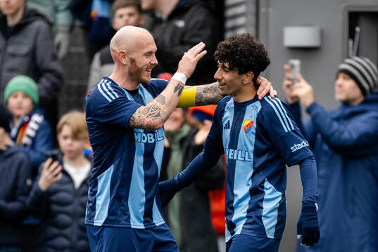 Djurgårdens Magnus Eriksson  och Ahmed Saeed jublar