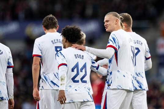 Oscar Bobb celebrate with Erling Braut Haaland of Norway