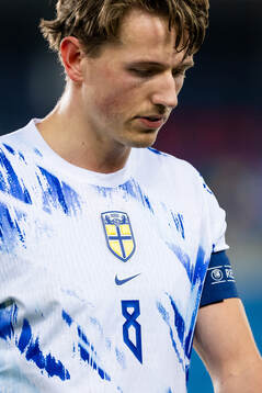 Sander Berge of Norway looks dejected