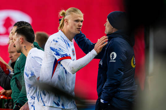 Erling Braut Haaland and Ståle Solbakken, head coach of