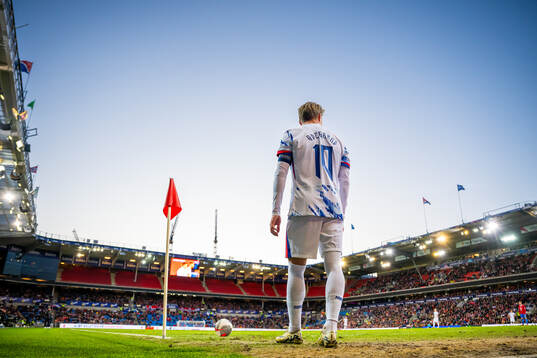 Martin Ødegaard of Norway takes a corner kick