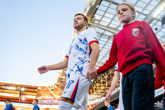 Fredrik André Bjørkan of Norway enters the pitch