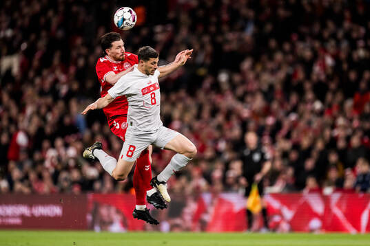 Pierre-Emilie Højbjerg of Denmark and Remo Freuler of