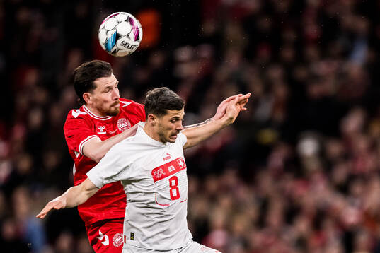 Pierre-Emilie Højbjerg of Denmark and Remo Freuler of