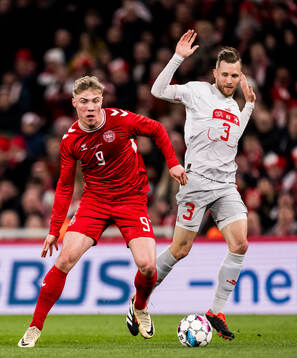 Rasmus Højlund of Denmark and Silvan Widmer of Switzerland