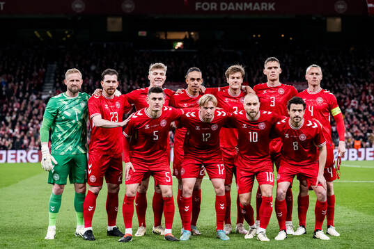 The starting eleven of Denmark pose for a photo