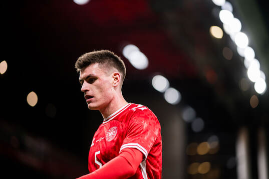 Joakim Mæhle of Denmark looks dejected