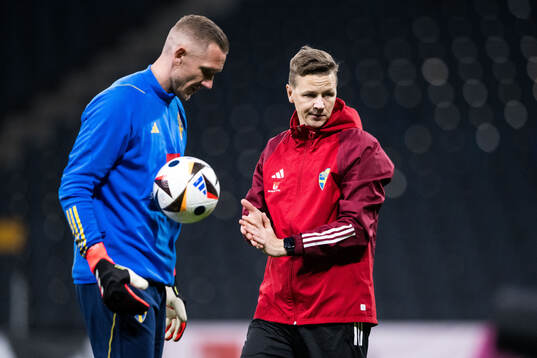 Goalkeeper Robin Olsen and Goalkeeper coach Maths Elfvendal