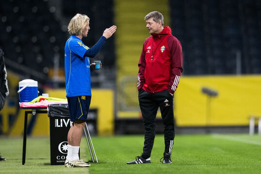 Emil Forsberg and Head coach Jon Dahl Tomasson of Sweden of