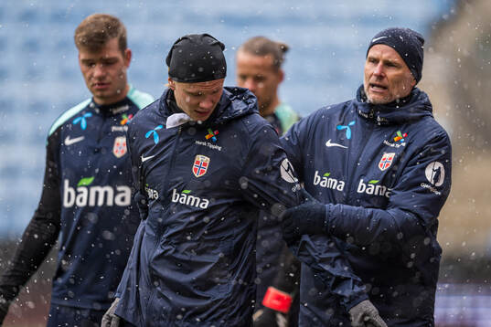 Erling Braut Haaland and Ståle Solbakken, head coach of