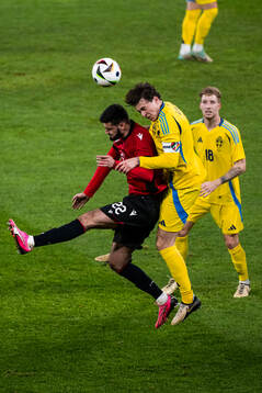 Armando Broja of Albania and Victor Nilsson Lindelöf of