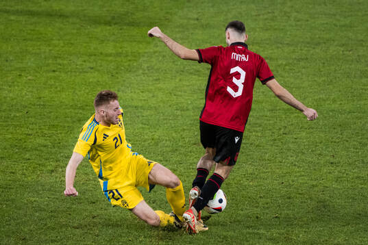 Dejan Kulusevski of Sweden and Mario Mitaj of Albania