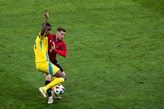 Alexander Isak of Sweden and Ivan Balliu of Albania