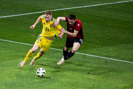 Dejan Kulusevski of Sweden and Arber Hoxha of Albania