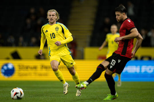 Emil Forsberg of Sweden and Enea Mihaj of Albania