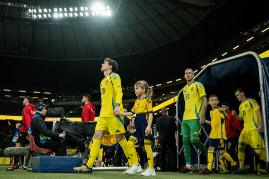 Victor Nilsson Lindelöf and goalkeeper Robin Olsen of