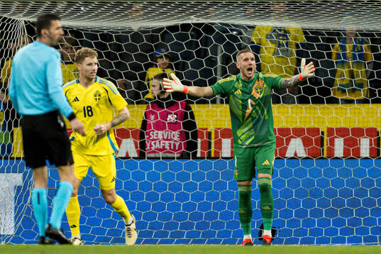 Goalkeeper Robin Olsen of Sweden reacts