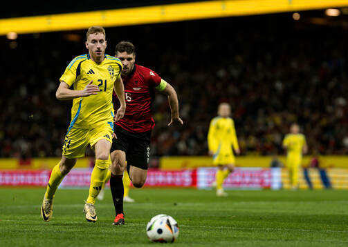 Dejan Kulusevski of Sweden and Berat Gjimshiti of Albania