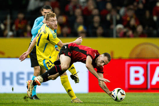 Dejan Kulusevski of Sweden and Mario Mitaj of Albania