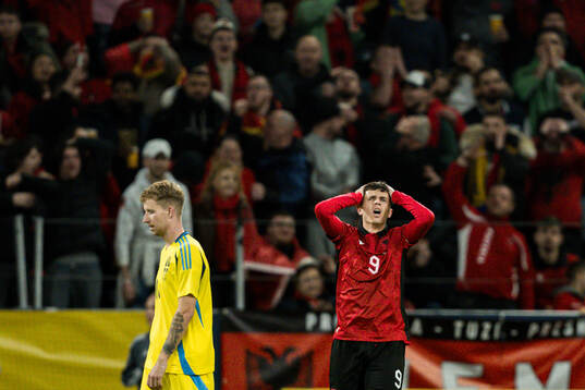 Jasir Asani of Albania looks dejected