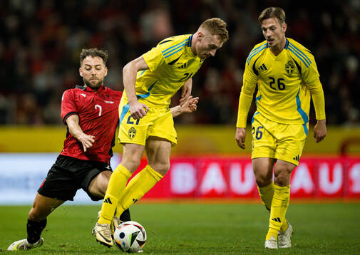 Keidi Bare of Albania and Dejan Kulusevski of Sweden