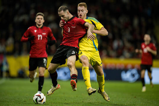 Mario Mitaj of Albania and Dejan Kulusevski of Sweden