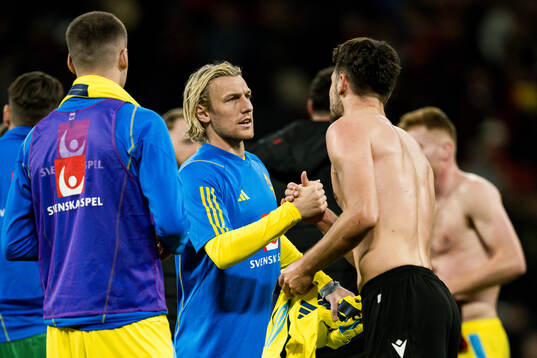 Emil Forsberg of Sweden and Berat Gjimshiti of Albania