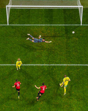 Emil Forsberg and Gustaf Nilsson of Sweden challenge Enea