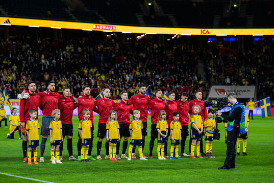 Players of of Albania sing their national anthem