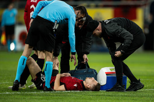 Ylber Ramadani of Albania in pain