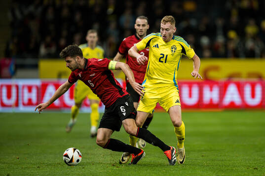 Berat Gjimshiti of Albania and Dejan Kulusevski of Sweden