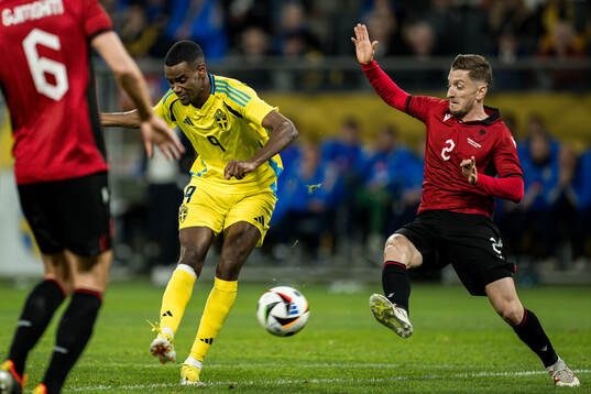 Alexander Isak of Sweden and Ivan Balliu of Albania
