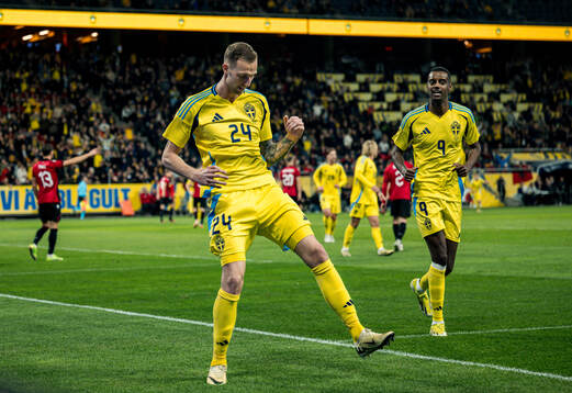 Gustaf Nilsson and Alexander Isak of Sweden celebrate the