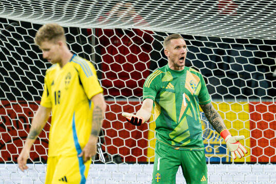 Goalkeeper Robin Olsen of Sweden reacts