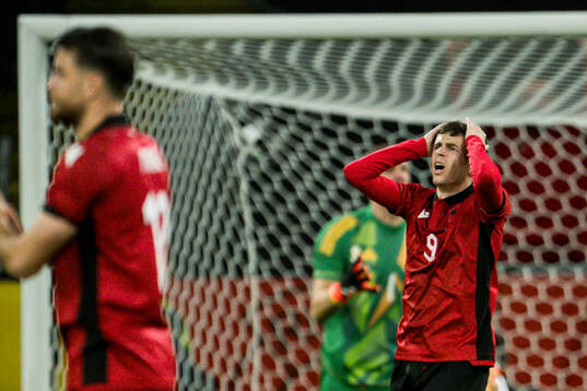 Jasir Asani of Albania looks dejected