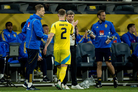 Emil Krafth and Head coach Jon Dahl Tomasson of Sweden