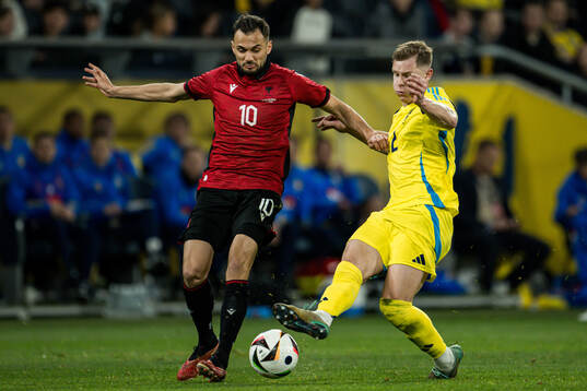 Nedim Bajrami of Albania and Emil Krafth of Sweden